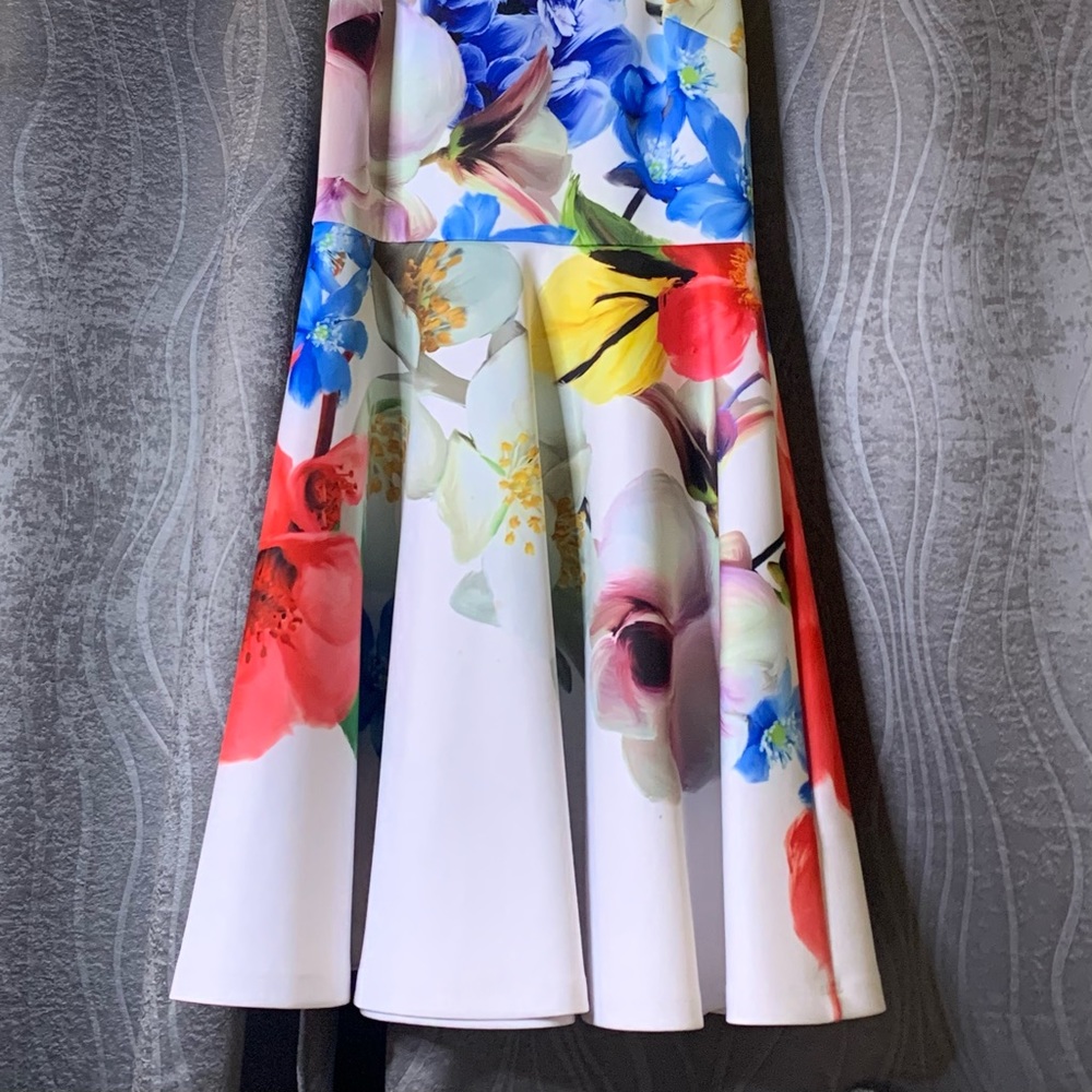Ted baker London with flowers design. Size 1 juniors. used one time.